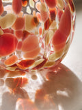 Glass pumpkin ornament with orange red confetti 13.5cm height, imported from the UK