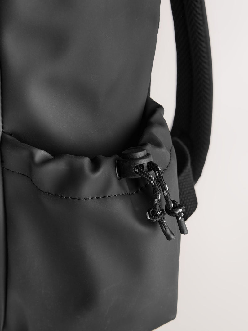 Black roll top backpack polyurethane construction - British product