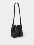Osprey London Monterrey leather bucket bag in black, imported from the UK