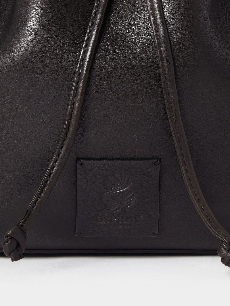 Osprey London Monterrey leather bucket bag in black, imported from the UK
