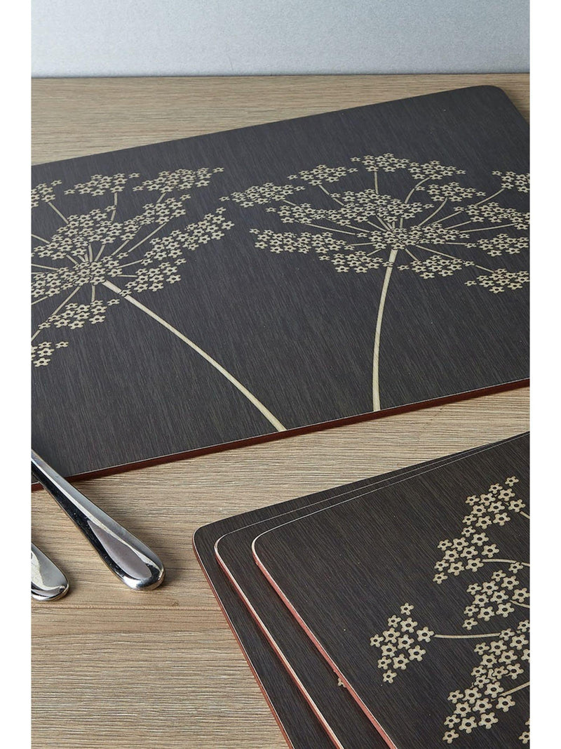 Black large cork backed placemats set with floral art - British product