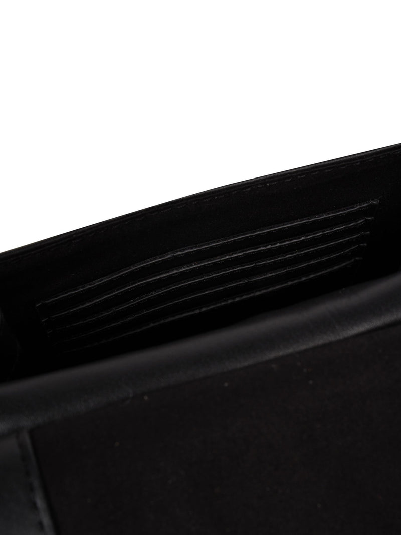 Pure Luxuries London black Erma leather cross-body bag, imported from the UK