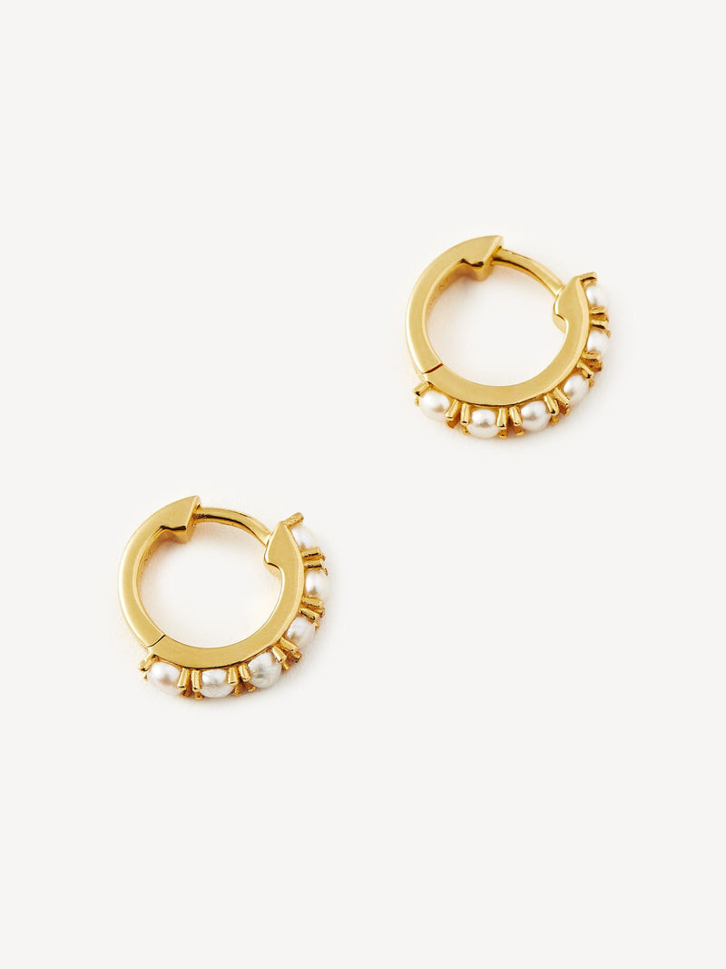 Missoma gold vermeil pearl huggie earrings, imported from the UK