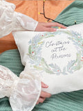 Solesmith linen wreath cushion personalised with family name (British brand)