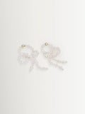 CompletedWorks loop-the-loop pearl earrings, UK version