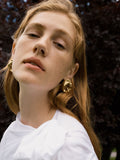 CompletedWorks gold tone scrunch earrings, imported from the UK