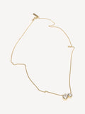 CompletedWorks gold tone peas in a pod necklace, imported from the UK