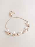 Gold tone sparkle pearl effect pully bracelet, UK version