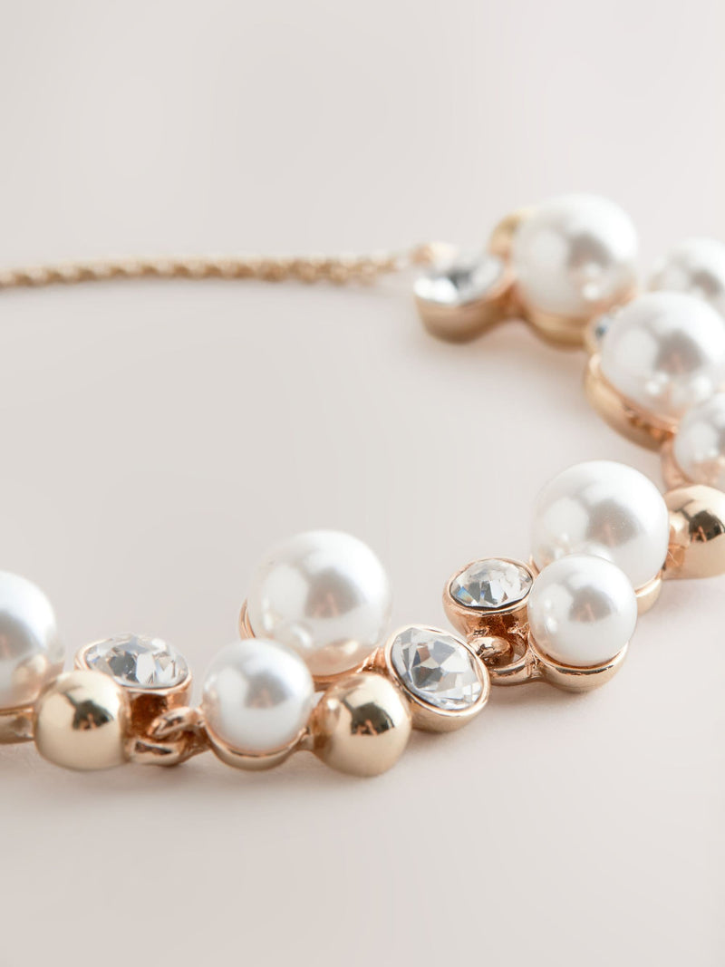 Gold tone sparkle pearl effect pully bracelet, UK version