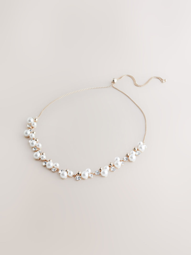 Gold tone sparkle pearl effect pully necklace and bracelet set, UK version