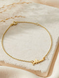 Posh Totty Designs personalised name bracelet in gold tone, imported from the UK