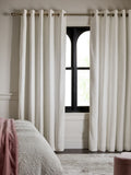 Cream embossed animal texture blackout eyelet curtains, UK version