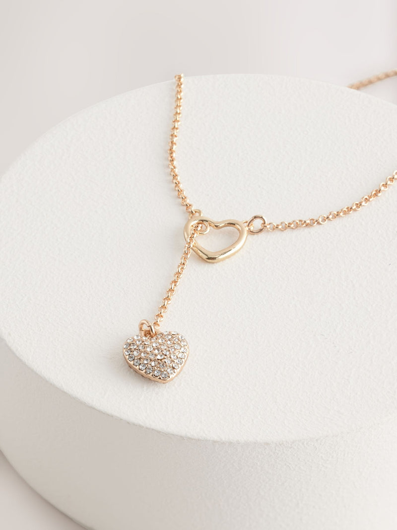 Gold tone heart thread through lariat necklace (British brand)