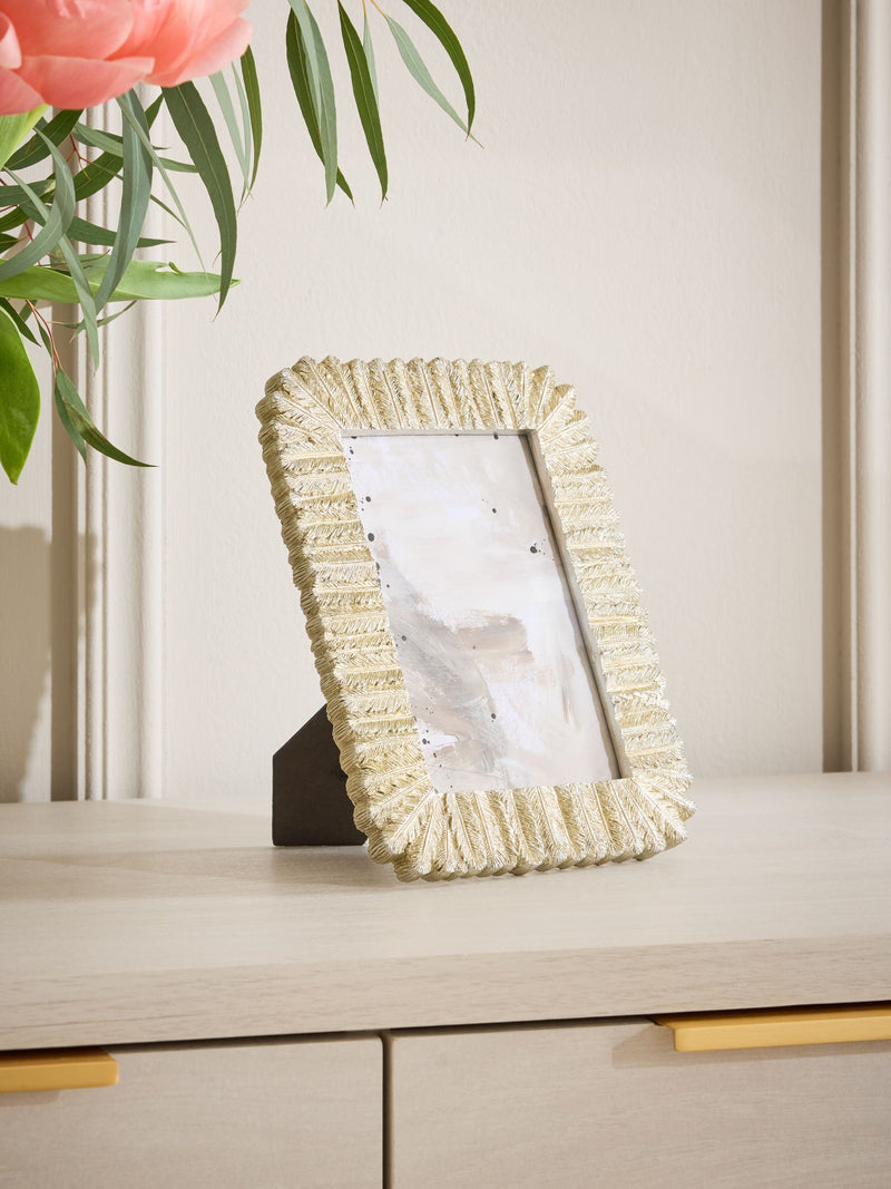 Silver feather photo frame suitable for wall or free-standing display (British brand)