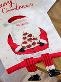 Red Santa Musical Light Up Table Runner, imported from the UK