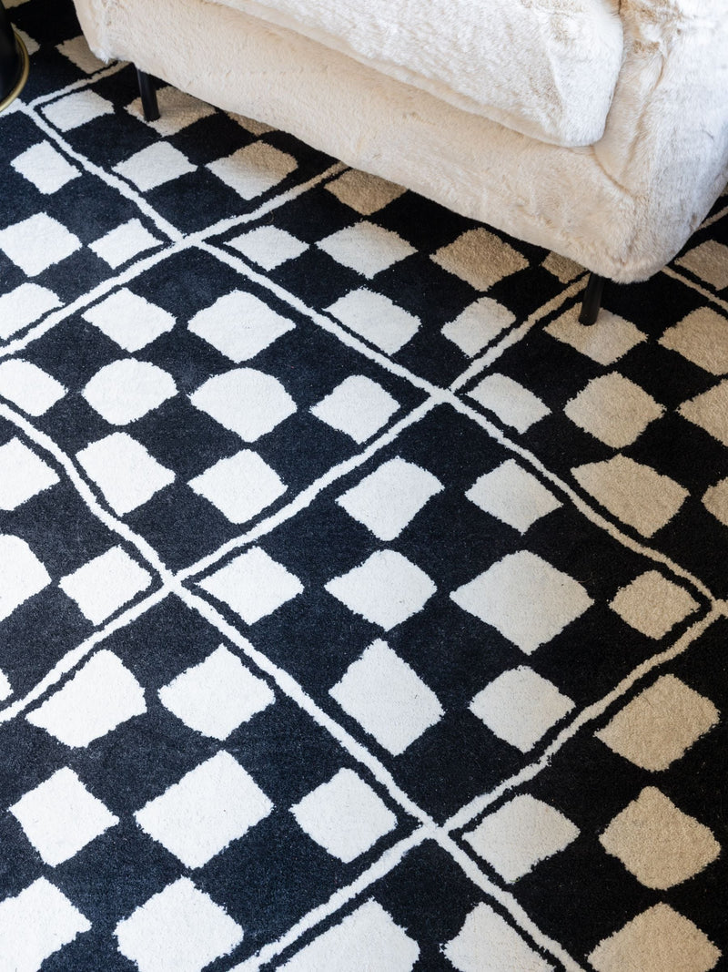 Rockett St George black checkerboard diamond tufted rug (British brand)