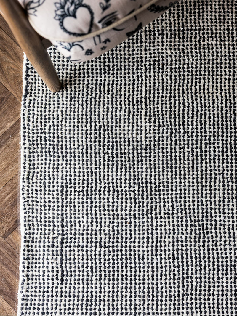 Rockett St George black dotty tufted rug, UK version