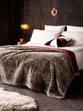Rockett St George burgundy faux fur throw, imported from the UK