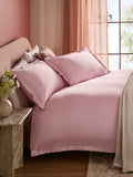 Pink box pleat duvet cover and pillowcase set with 200 thread count cotton, imported from the UK