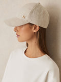 Reiss linen baseball cap with gold-tone R logo, UK version