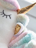 White unicorn cushion with colour-changing lights, imported from the UK