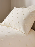 Natural tufted spot duvet cover and pillowcase set, imported from the UK