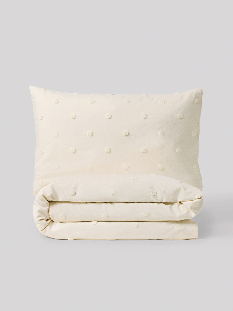 Natural tufted spot duvet cover and pillowcase set, imported from the UK