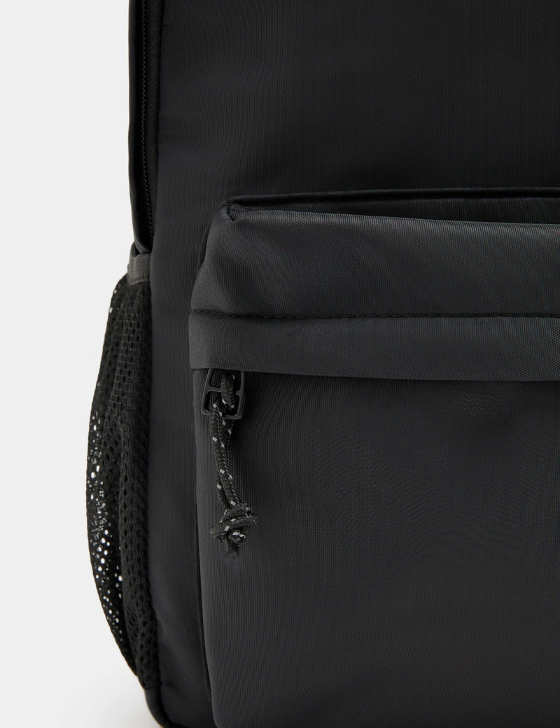 M&S smart backpack with zip fastening front pocket - British product