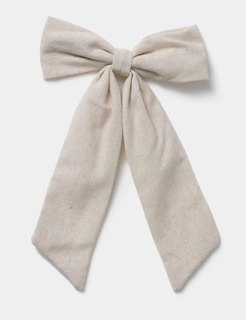 Beige linen bow hair accessory, imported from the UK