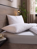 Snuggledown medium support pillow with cotton cover, imported from the UK