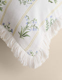 Cotton rich floral cushion with fringed edge, UK version