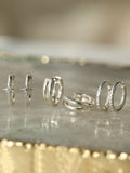 Carrie Elizabeth diamond mini hoop earrings (British brand)