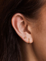 Next Carrie Elizabeth Gold Diamond Mini Hoop Huggie Earrings- Buy online at McGrocer