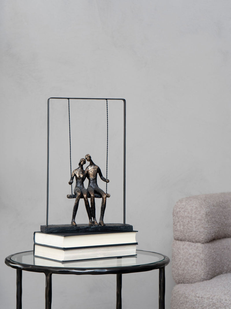 Libra Interiors bronze couple on swing sculpture 37cm height, UK version