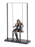 Libra Interiors bronze couple on swing sculpture 37cm height, UK version