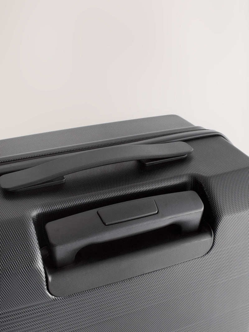 Black medium suitcase with ABS hard shell and TSA lock - British product