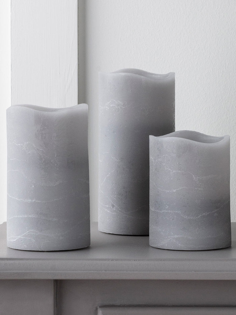 Lights4fun grey LED pillar candle trio assorted heights - British product