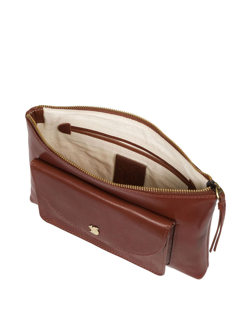 Conkca London leather clutch bag in conker brown, imported from the UK