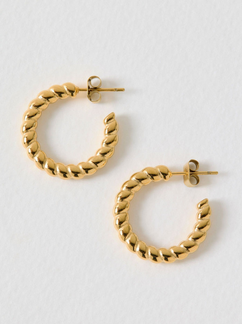 Oliver Bonas gold tone waterproof curved edge hoop earrings, UK version