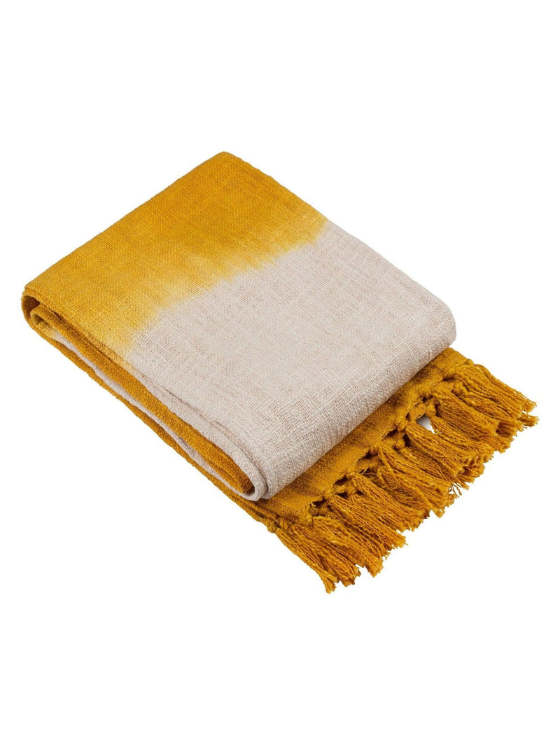Furn Mizu dip dye ochre yellow cotton throw, imported from the UK
