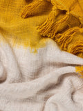 Furn Mizu dip dye ochre yellow cotton throw, imported from the UK