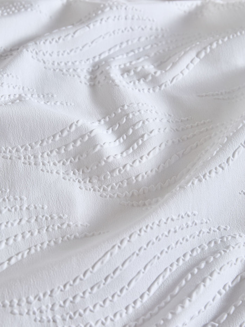 White wave embossed duvet cover and pillowcase set (British brand)