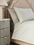 Pale sage green duvet cover and pillowcase set, imported from the UK
