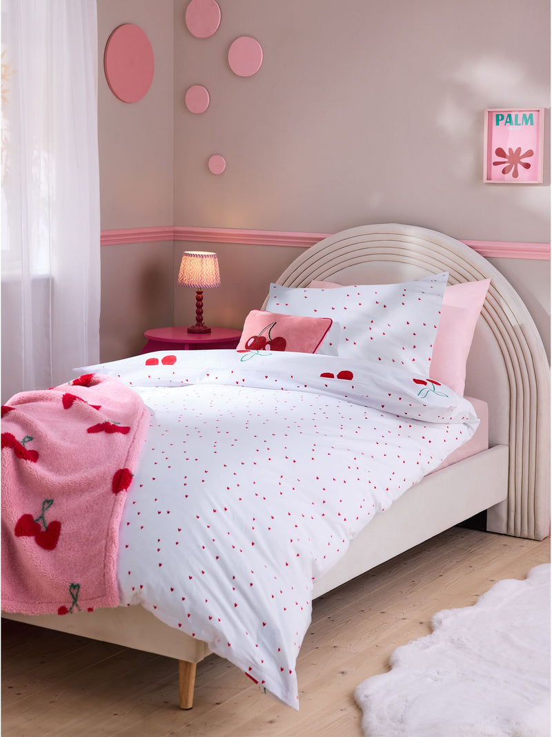 Red Cherry Poms printed polycotton duvet cover and pillowcase set, imported from the UK