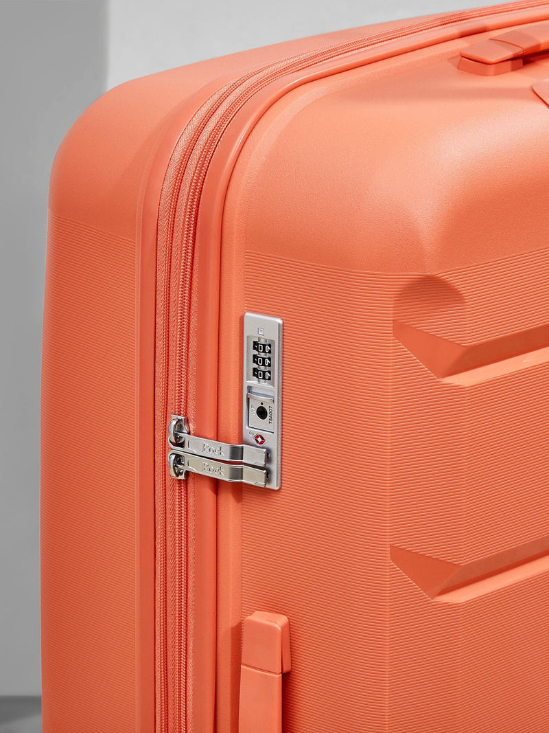 Rock Tulum medium suitcase in orange, imported from the UK