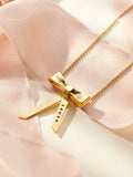 Posh Totty Designs bow charm necklace, imported from the UK