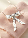 Posh Totty Designs personalised bow charm necklace, imported from the UK