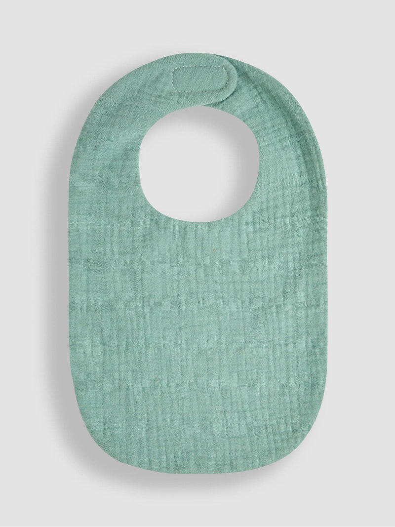JoJo Maman Bébé green muslin frill bib, UK version