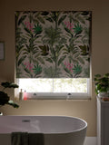 Tropical leaf print blackout roller blind in green and pink, UK version