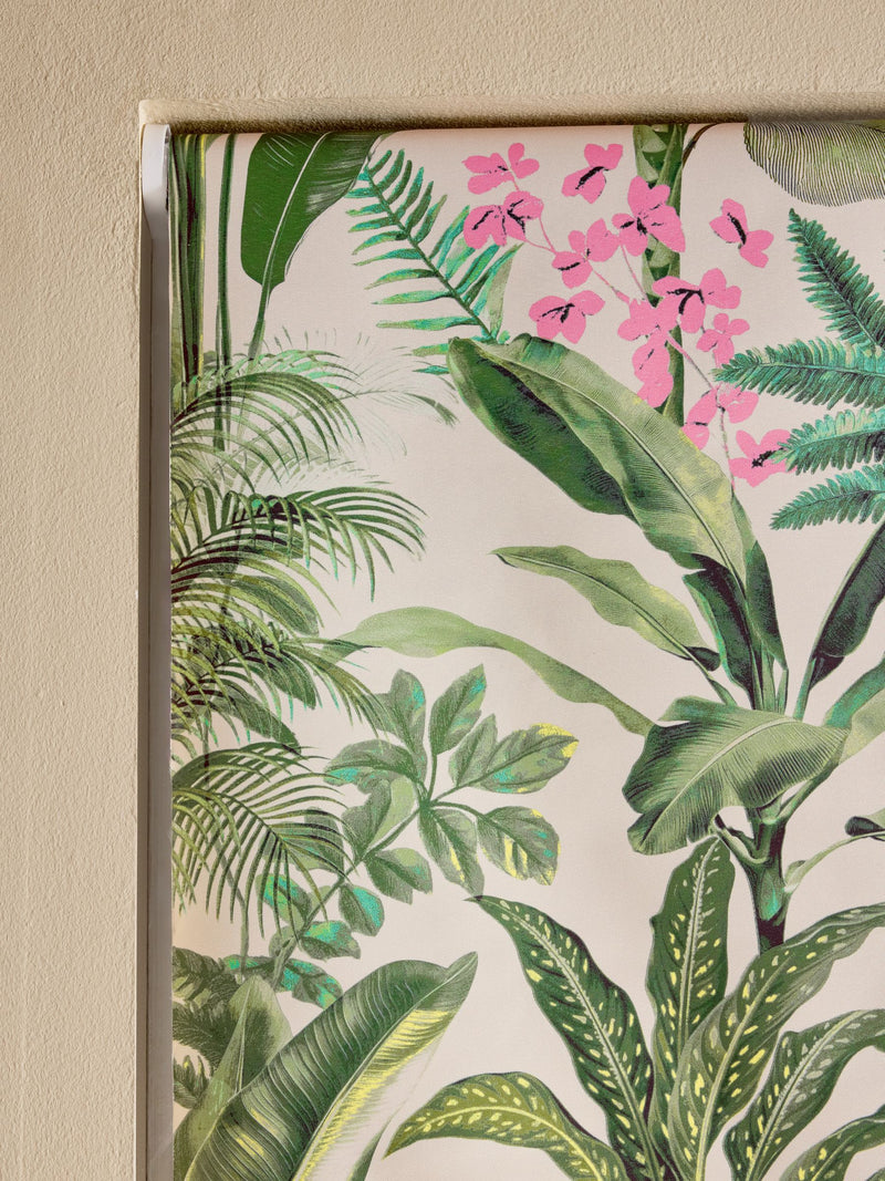 Tropical leaf print blackout roller blind in green and pink, UK version
